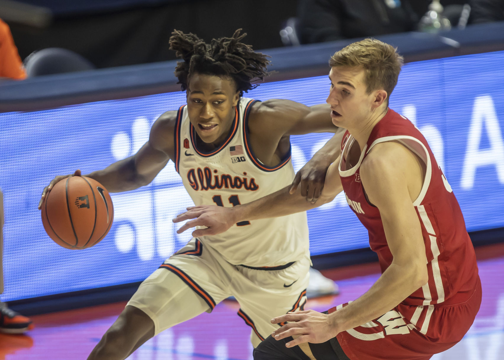 Illinois 75, UW 60